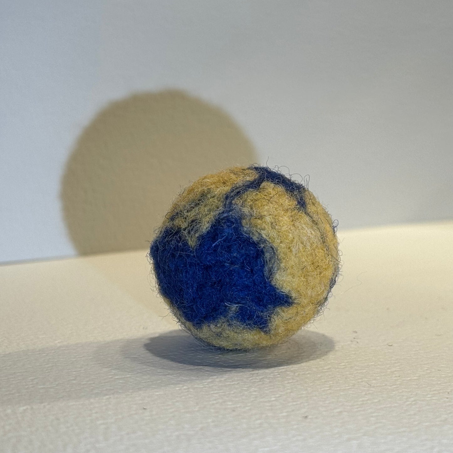 Natural wool ball toy for cats